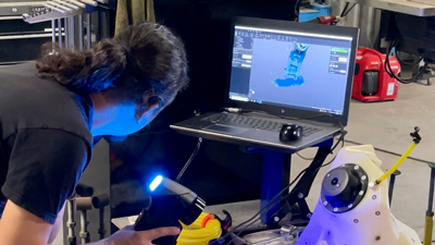 A tech working on a 3d model